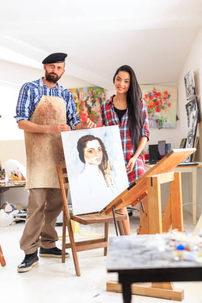 istock Apprentice and teacher showing a new portraiture 643035186