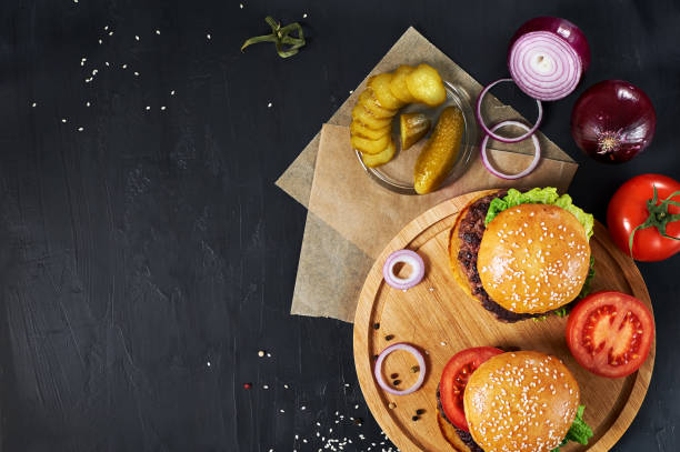 istock Craft beef burgers with vegetables. 643038812