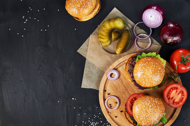 istock Craft beef burgers with vegetables. 643038818