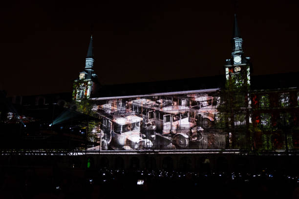 Scenes of the history of Madrid projected over the four facades of the main square (Plaza Mayor) during the celebrations of its 400 aniversary. Video mapping designed by artist Óscar Tesón.