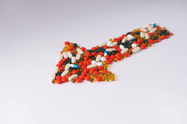istock Different pills laid out in the form of arrow 643043546