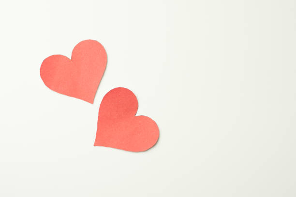 istock Red paper heart on white background 643047420