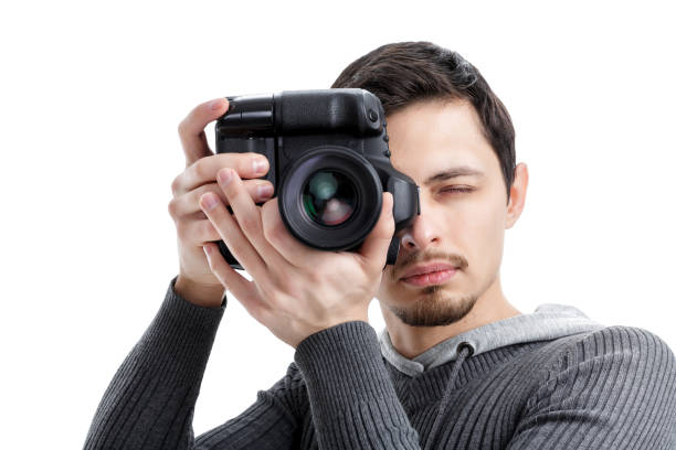 istock successful professional photographer use DSLR digital camera iso 643054354