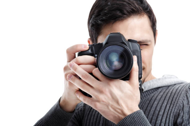 istock successful professional photographer use DSLR digital camera iso 643054386