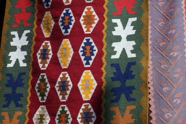 istock Hanged handmade traditional wool rug - vintage background close up 643056528