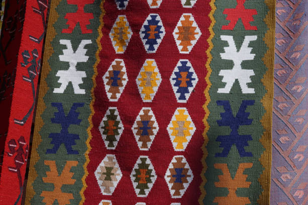 istock Hanged handmade traditional wool rug - vintage background close up 643056532