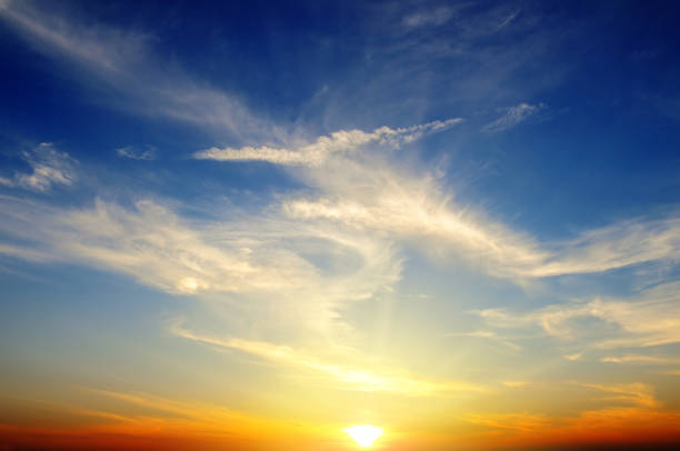 istock beautiful sunrise and cloudy sky 643059764
