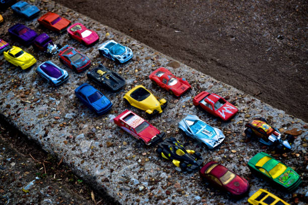 istock Pocket sized cars sit in pretend traffic. 643063996