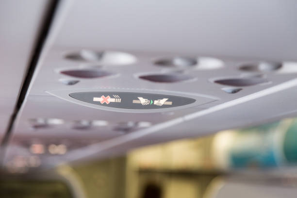 istock Plane interior No Smoking and Buckle Seat-Belt signage 643066556