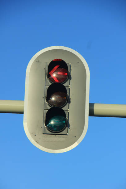 istock Traffic lights in a clear blue sky 643077382