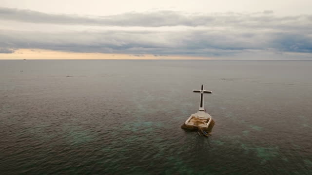 Catholic cross in the sea