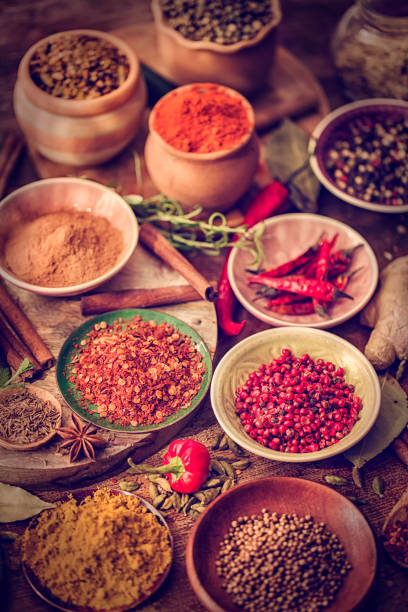 istock Spices and Herbs on Wooden Background 643093310