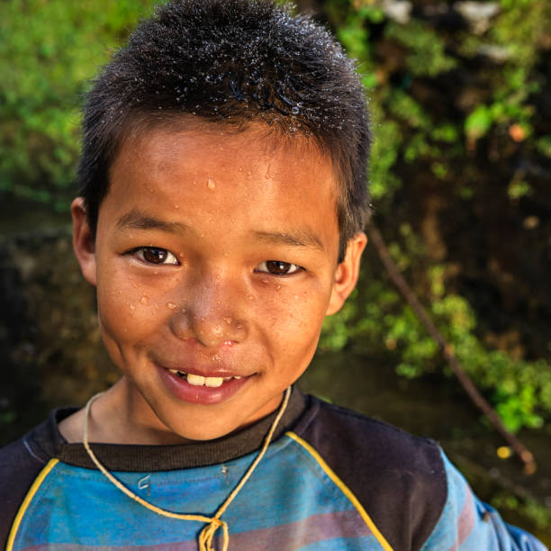 istock Happy Nepalese boy near Annapurna Range 643093784
