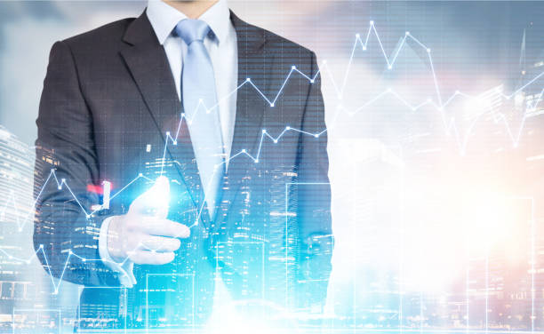 istock Man in suit, graphs and city 643097424