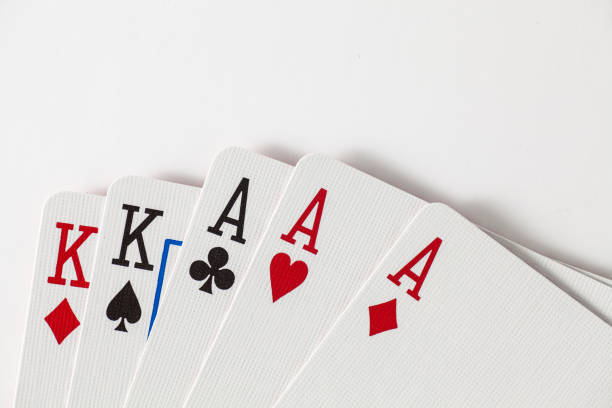 istock Playing Cards full house, kings and aces with space at top 643113438