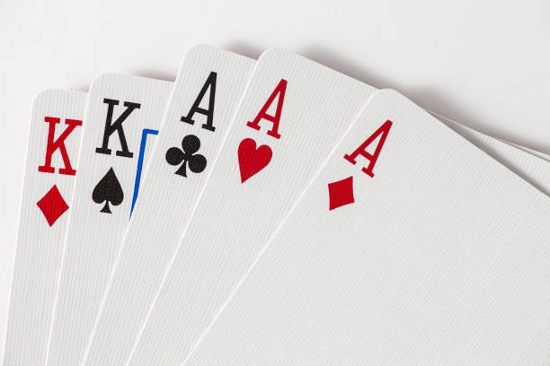 istock Playing Cards full house, kings and aces with space at top 643113448
