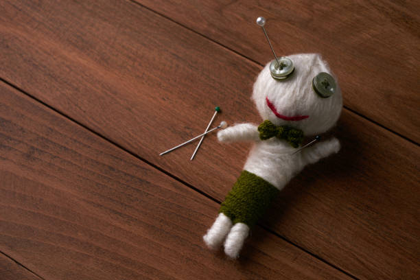 Cute Little Voodoo Doll with pins.Copy space.