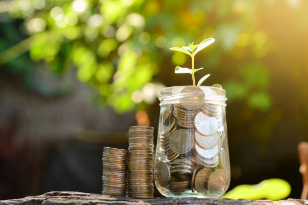 istock Save money with stack coin for growing your business 643120072