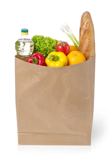 istock Brown paper bag full with groceries 643126878