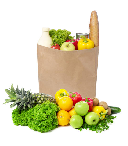 istock Brown paper bag full with groceries 643129264