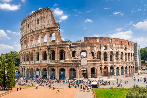istock Colosseum with clear blue sky and clouds, Rome,Italy 643129562