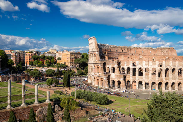istock Colosseum with clear blue sky and clouds, Rome 643130314