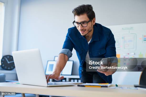 Web Developer Designer Working On Laptop Stock Photo - Download Image Now - Laptop, Men, 20-29 Years