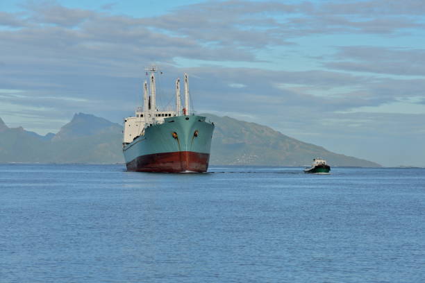 Trawler enter the port, Papeete, French Polynesia, morning