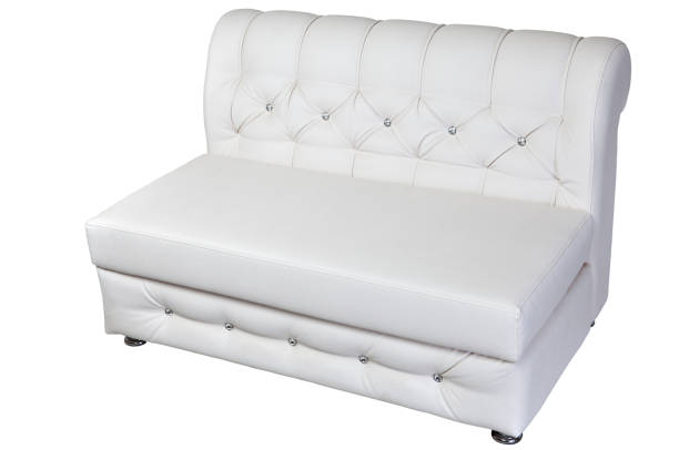 istock White leather modern banquette bench with storage space, isolated background. 643145942