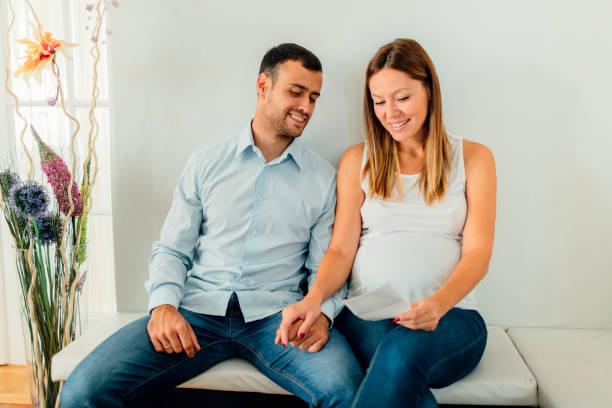 istock Pregnant woman and her man 643146248