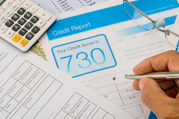 istock Credit report form on a desk with other paperwork. 643148852