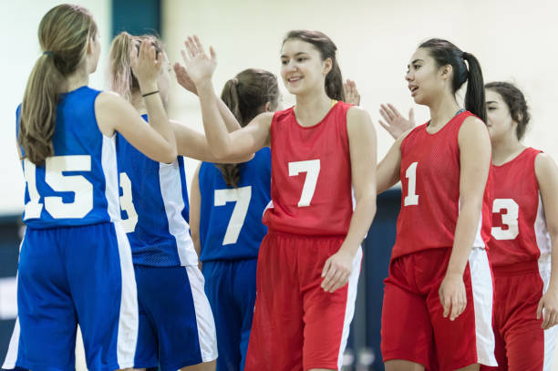 istock Girls high school volleyball team 643153406