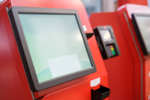 istock Self service cash desk with screen and card payment terminal 643154056