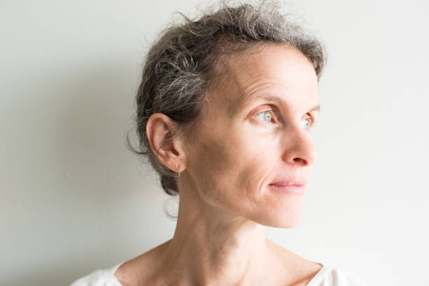 istock Middle aged woman looking hopeful 643157884