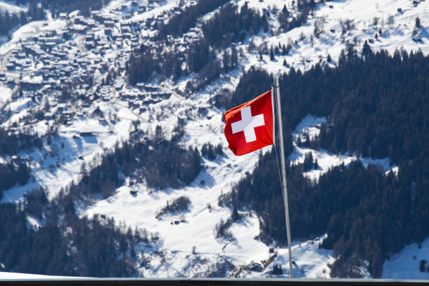 istock Swiss flag in the mountains 643172158