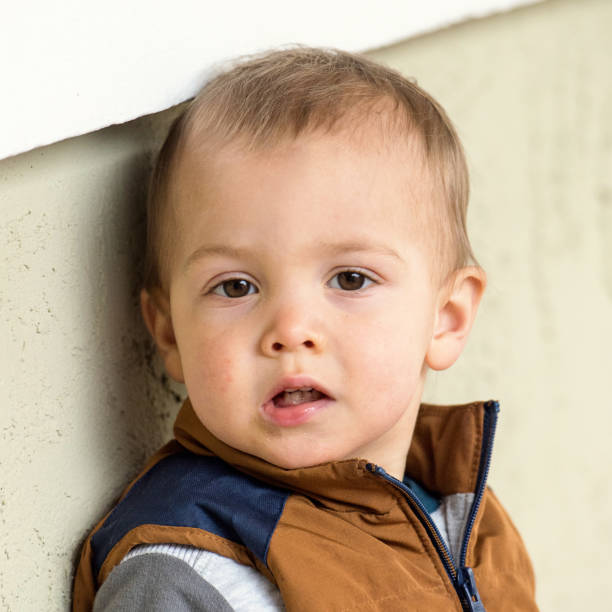 istock Baby boy looking at the camera 643175256