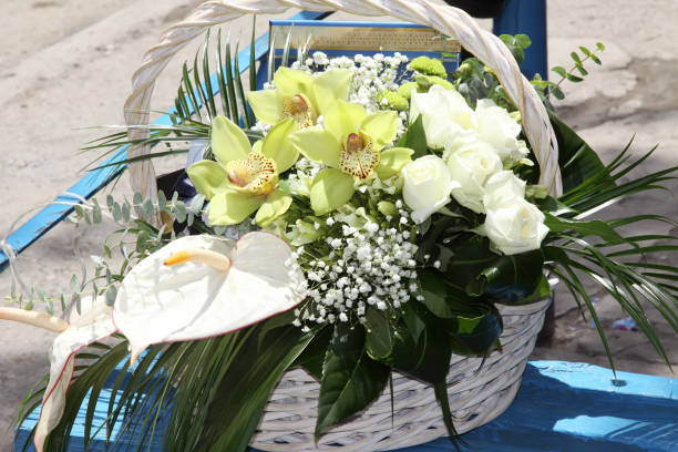 istock Bunch of flowers outdoors in a basket for a bride 643178494