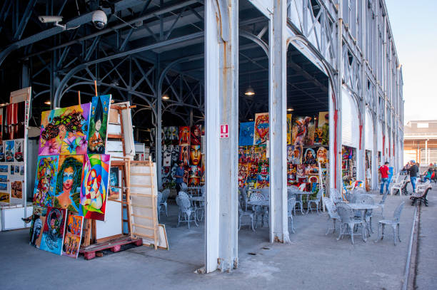 HAVANA,CUBA- January 22,2014 : Tourists were visiting the art and handicrafts market in Old Havana