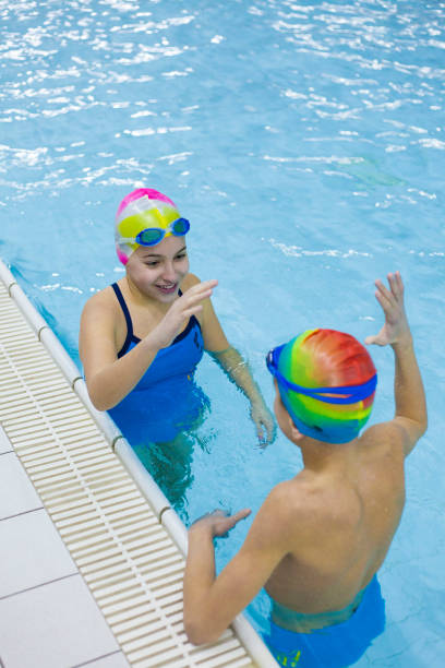 istock teens at swimming class 643212162