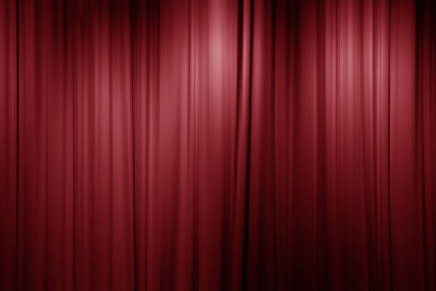 istock soft red curtain in theater background 643212676