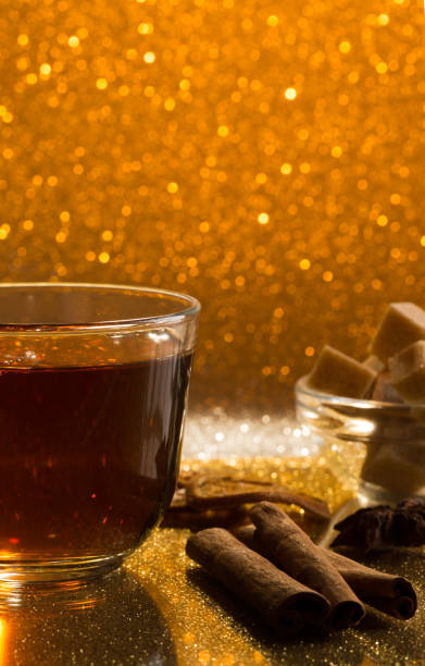 istock Glass cup of fresh hot tea and cane sugar 643224250