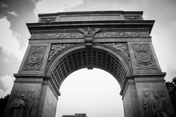 The Washington Square Arch with sky and vignette frame in black and white style, Washington Square Park, New York