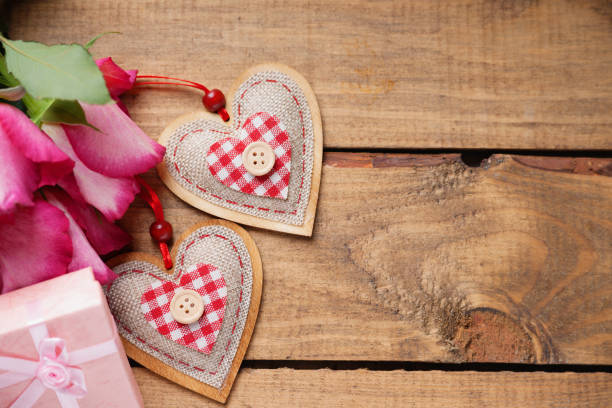 istock Heart shapes with gift box and flowers 643251478