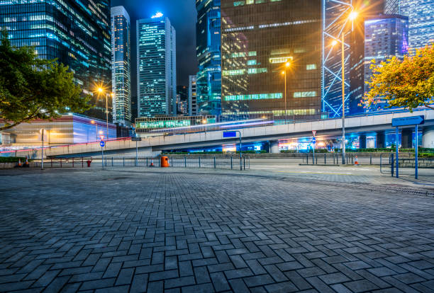 istock view of downtown district at night from sidewalk,Hong Kong 643254514