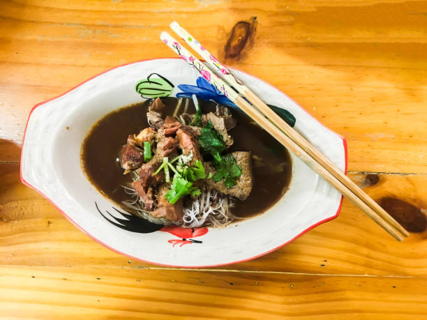 istock Thai style rice noodle soup with stewed beef. 643258318
