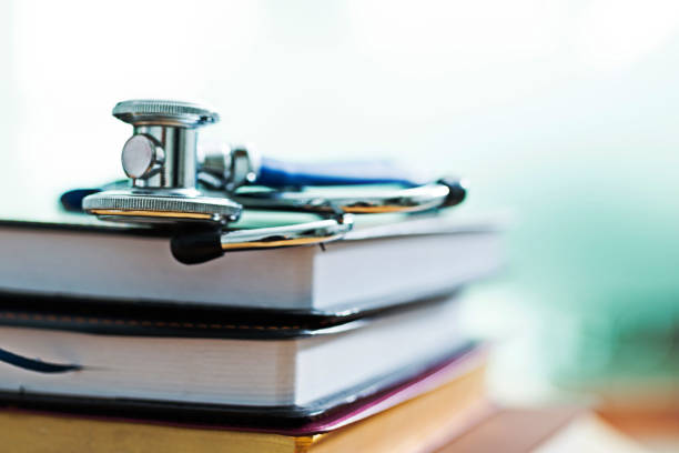 istock Medical stethoscope on books 643261618