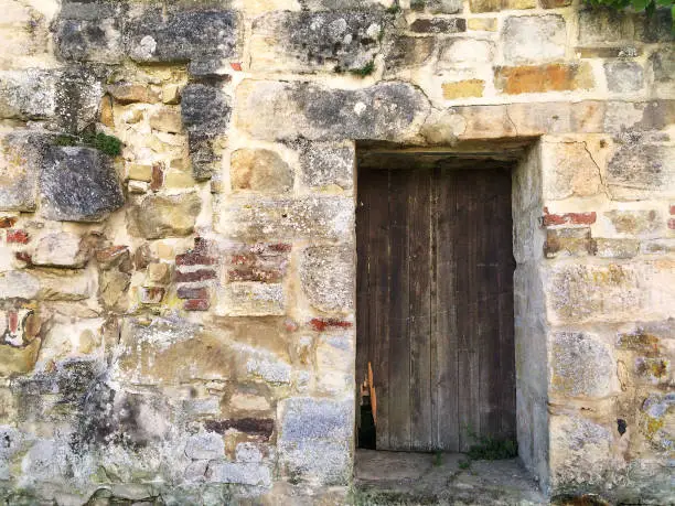 old gate in an abbey wall