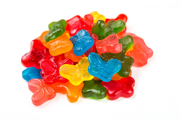 istock Sugar free gummy butterflies isolated on a white background 643267596