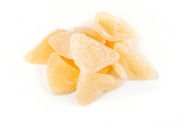 istock Organic gummy grapefruit slices isolated on a white background 643267758