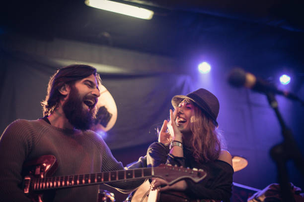 istock Guitarist and his girl 643268536
